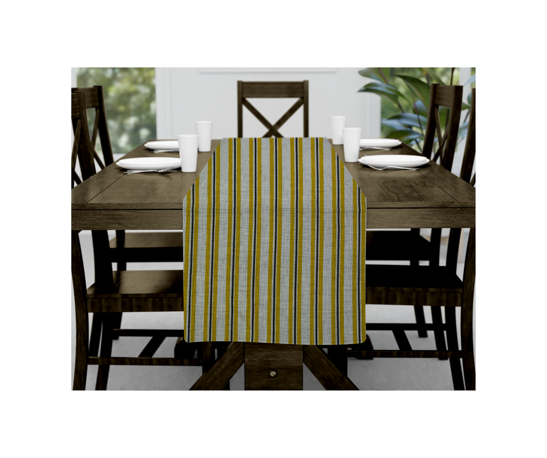 Cotton table linen striped table runner on wooden dining table with chairs and tableware